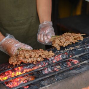 Grilled beef skewers (suya-style) on a plate (placeholder product image)