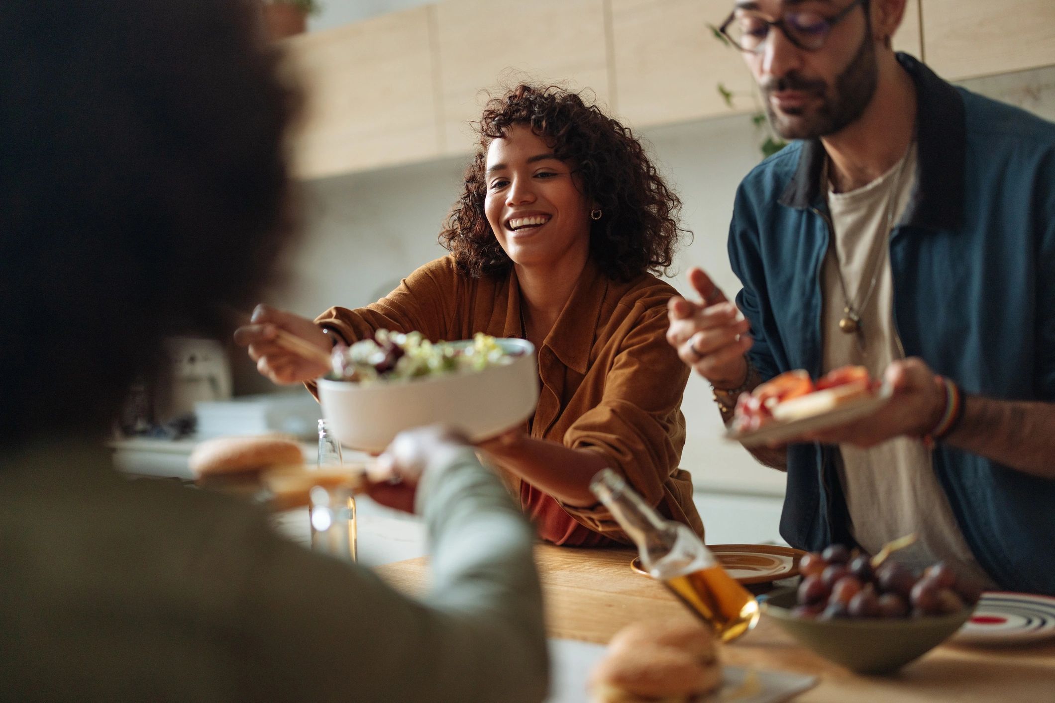 Friends sharing homemade food around a table