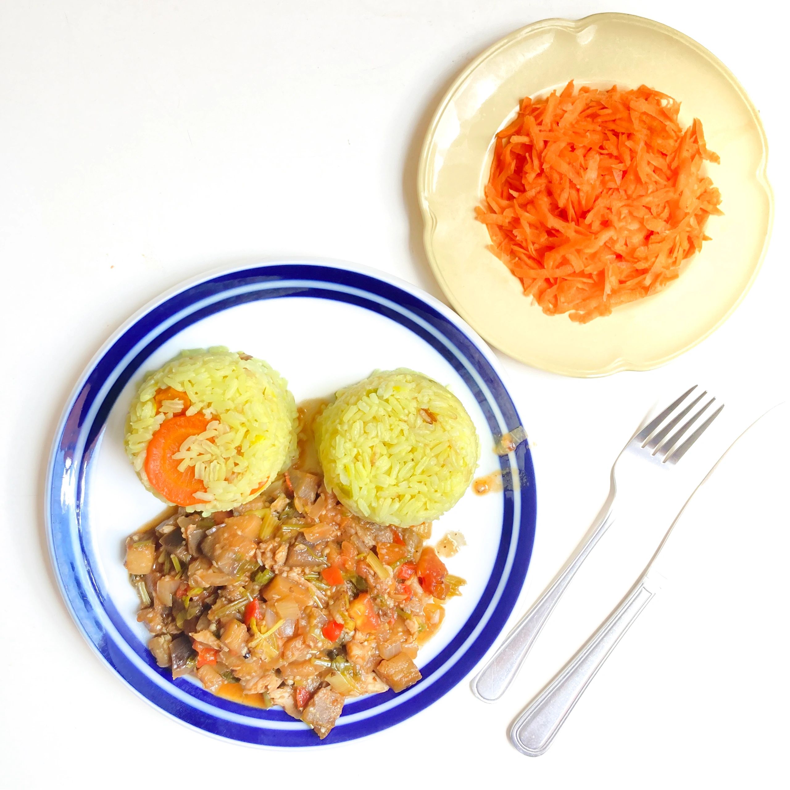 Home-cooked meal served with rice and salad